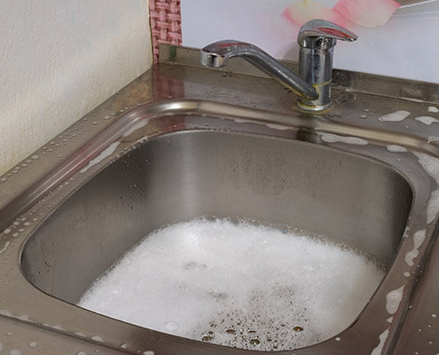 slow draining or clogged sink