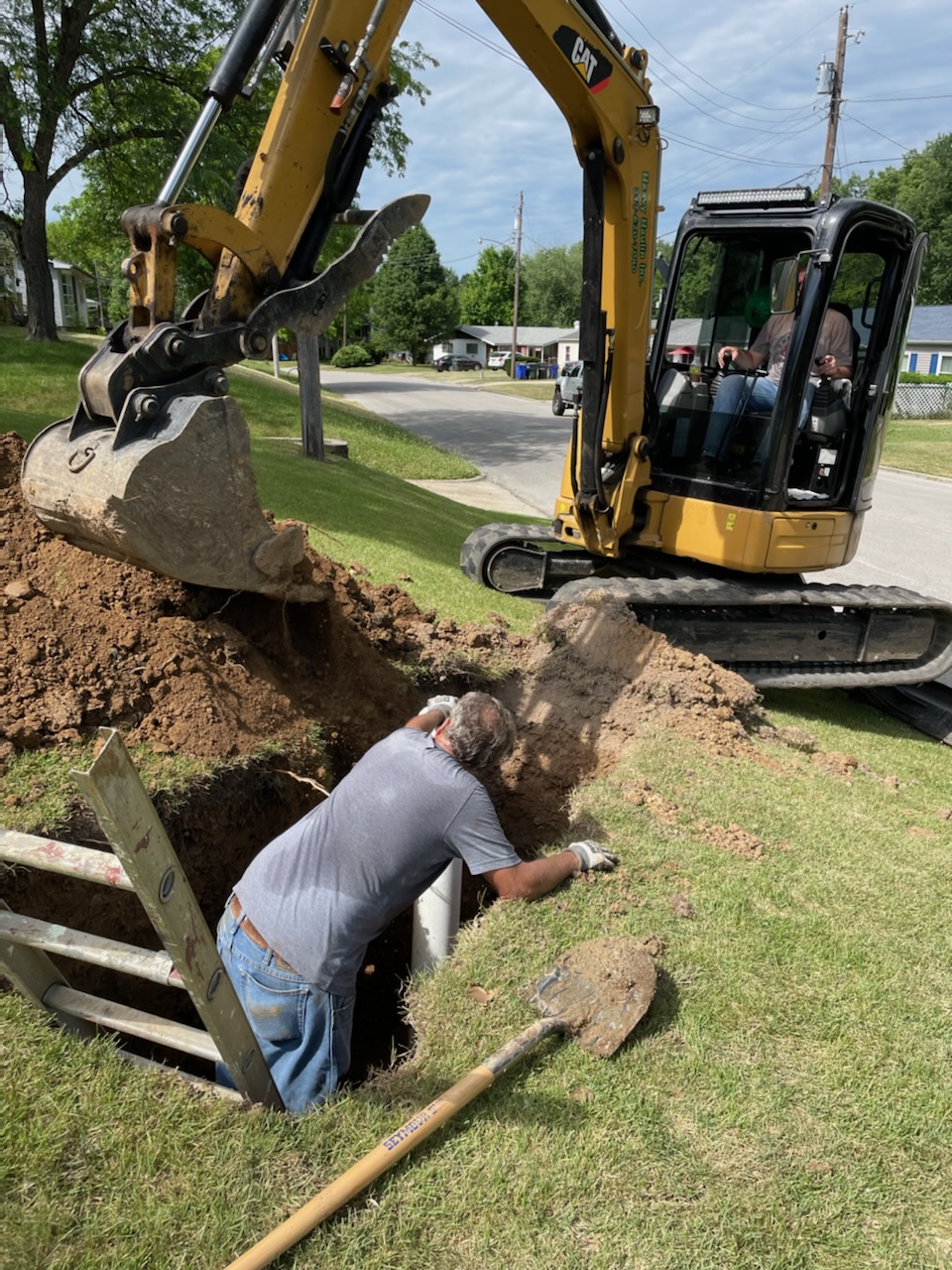 Parks Sewer Service - professionals using mini excavator - Decatur, IL